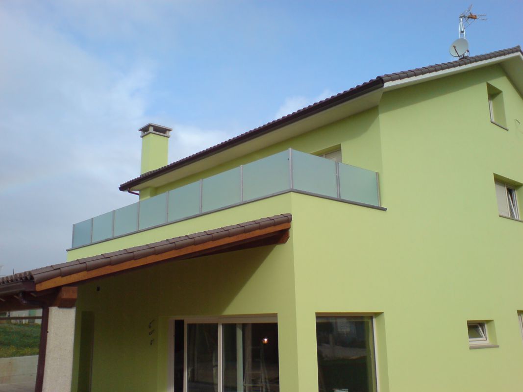 Terraza de chalet acristalada