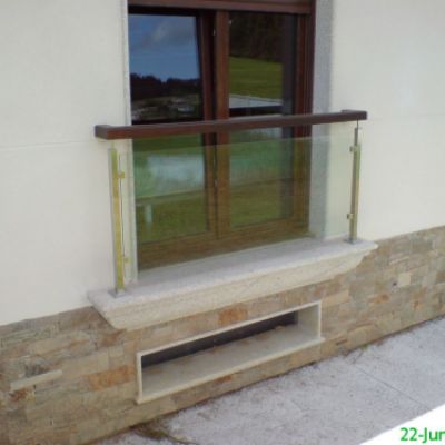 Terraza con frontal de vidrio